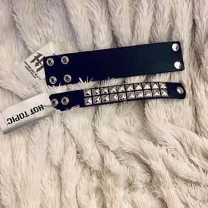 A studded bracelet & plain leather Hot Topic